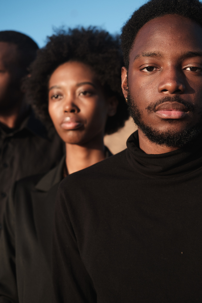 Man and Woman Wearing Black Clothing